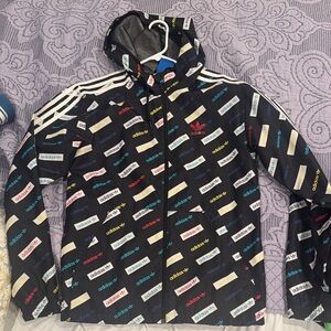 Adidas Black Windbreaker with Multicolor Logo Pattern